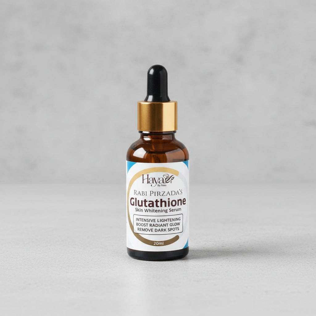 Glutathione serum bottle with dropper on a wooden surface