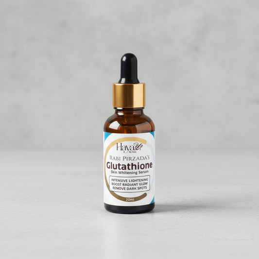 Glutathione serum bottle with dropper on a wooden surface
